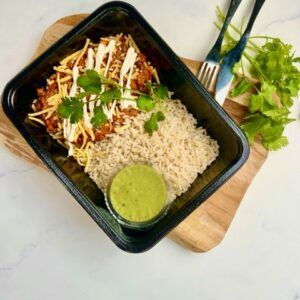 Chili con carne met volkorenrijst, cheddar & zure room