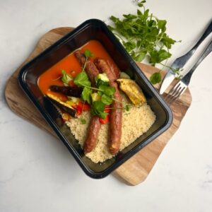 Merguez met kruidige tomatensaus, couscous & tajinegroenten
