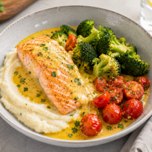 Zalm met bloemkoolpuree, curry, broccoli & kerstomaten