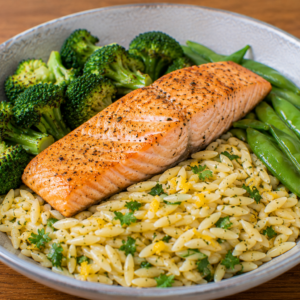 Ovengebakken zalm, orzo citroen, broccoli & peultjes